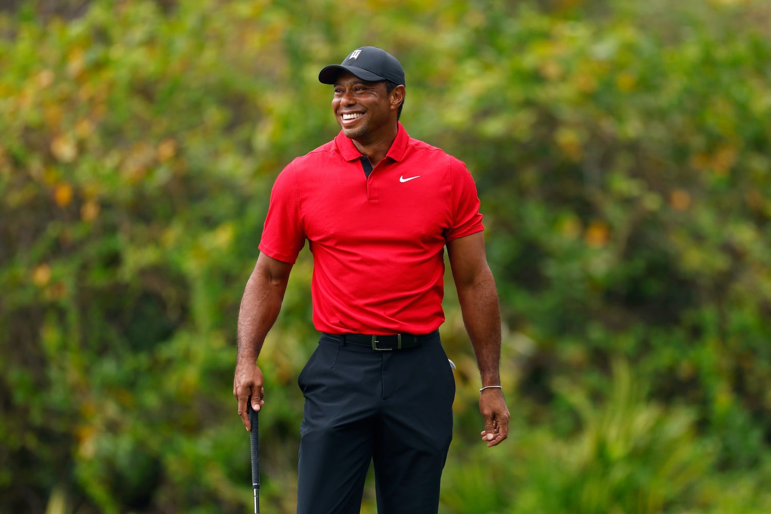 Tiger Woods celebrating on the green — replace with licensed photo